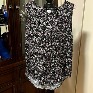 Black, purple, green floral sleeveless, button up top. Kismet size M.